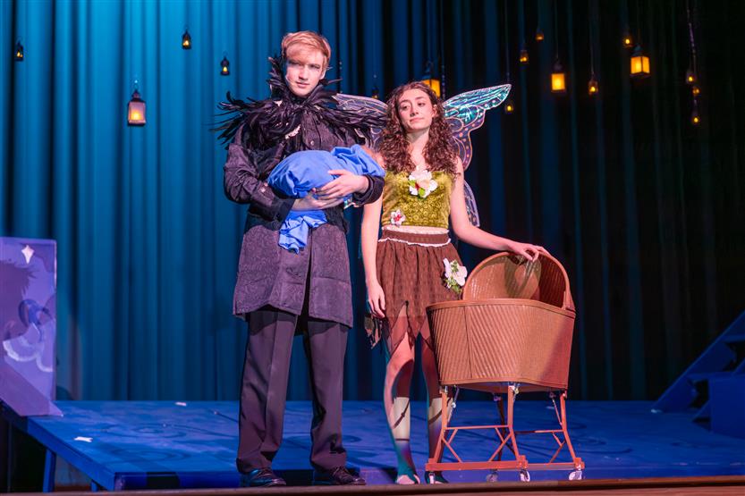 Students perform onstage